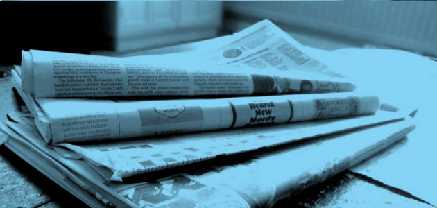 image of newspapers for the cost of not investing in digital transformation