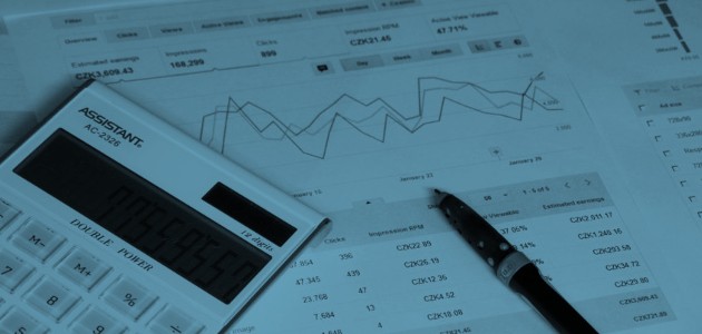 image of papers with charts figures and a calculator to represent the hidden harm of the luddite line