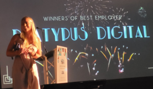 Nikki accepts the award for best employer