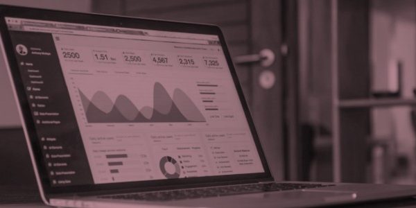 laptop screen with charts and figures showing four things holding back online fundraising