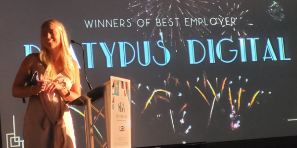 Nikki accepts the award for best employer
